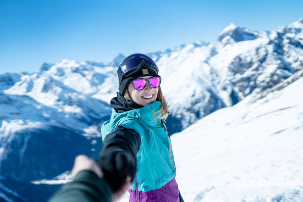 istock On walk at the ski resort. Follow me concept. 1294857319