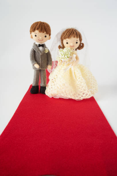 istock Small and cute Amigurumi doll.wedding 1294857503