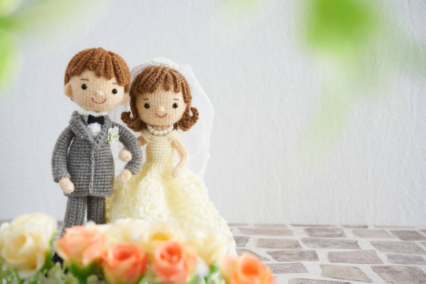 Amsterdam, Netherlands - October 4, 2015: In Amsterdam, the capital of gay marriage. The gay cake toppers are on display in the  window of a Bakery in the City center of Amsterdam, the Netherlands