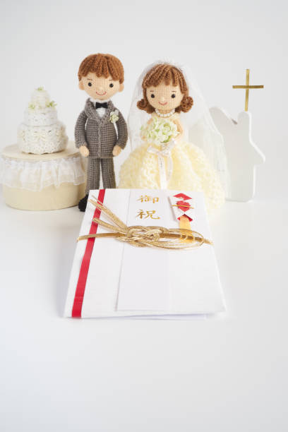 istock Small and cute Amigurumi doll.wedding 1294857625
