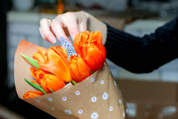istock The florist assemble a bouquet 1294861871