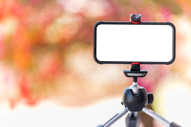 istock Smartphones on a tripod for live video teaching students online 1294862077