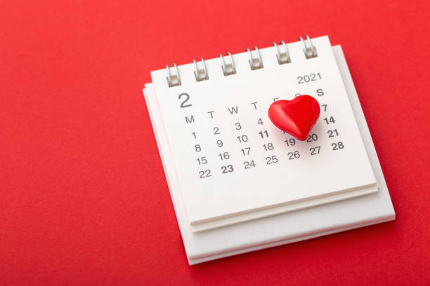 istock Valentines day concept with calendar and red heart 1294862657
