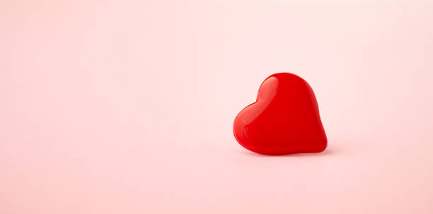 istock Valentines heart on pink background 1294862684
