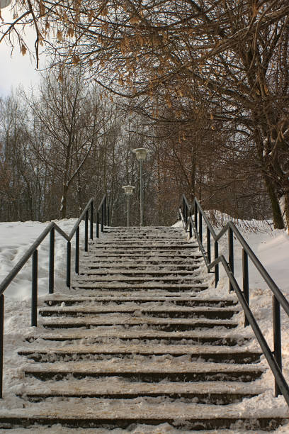 istock stairs leading to a snow covered hillock 1294868212
