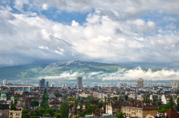istock Panoramic view over the city with cloudy skies in Sofia, Bulgaria 1294872806