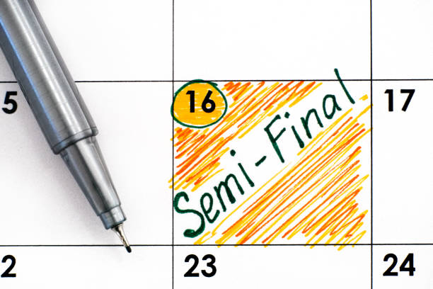 istock Reminder Semi-Final in calendar with pen 1294877125