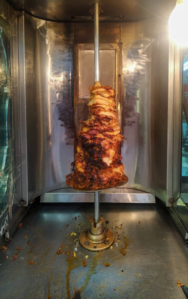 istock Grilled chicken with the rod after processing, food background 1294879097