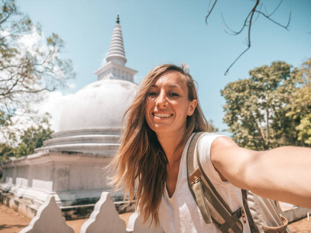 istock Woman takes selfie with temple 1294882339
