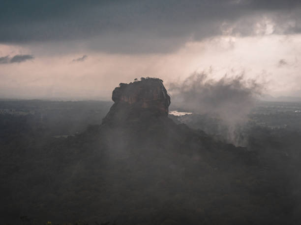 istock Sigiriya rock at sunset, tropical storm approaching, Sri Lanka 1294882603