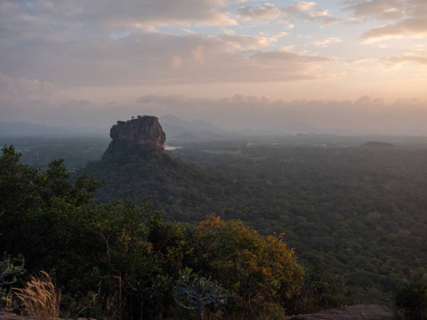 istock Sigiriya rock at sunset, tropical storm approaching, Sri Lanka 1294882659