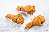 crispy kentucky fried chicken drumstick. White background. Top view