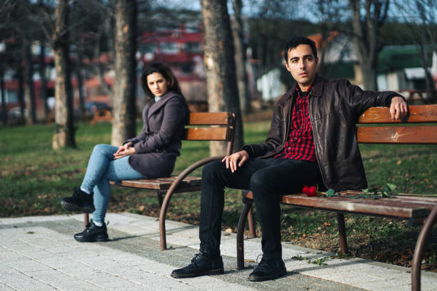 istock Sad young couple breaking up on Valentine's Day 1294883127