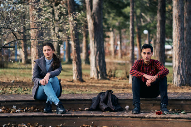 istock Sad young couple breaking up on Valentine's Day 1294883718