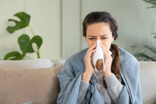 istock Young woman suffering from cold 1294884971