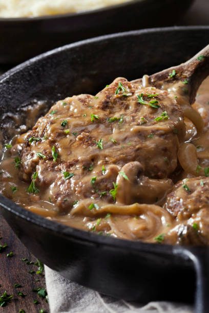 istock Salisbury Steak in a Rich Mushroom and Onion Gravy with Mashed Potatoes 1294890341