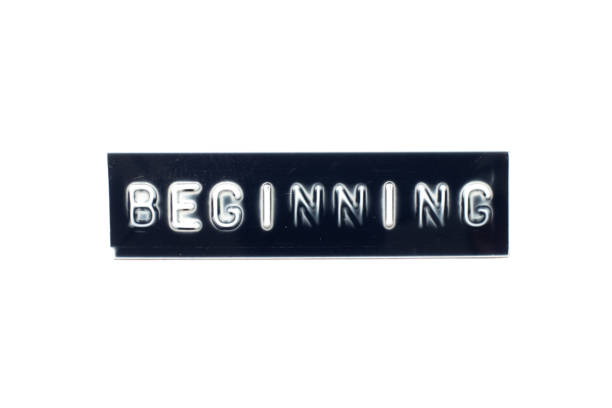 istock Embossed letter in word beginning on black banner with white background 1294891291