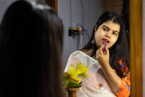 istock Indian woman in front of mirror 1294892157