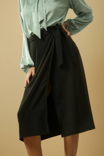 istock Studio shot of black A line midi skirt on unrecognizable model 1294893160