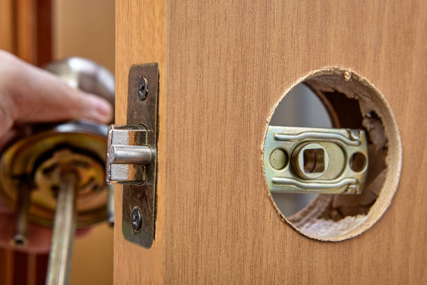 istock Installation of a handle with a latch lock for an interior door. 1294894194