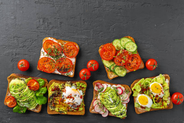 istock Menu background with variety of different vegan sandwiches 1294895762