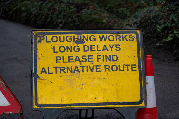 Ploughing works mis-spelt warning sign A ploughing works sign with a spelling mistake misspelled stock pictures, royalty-free photos & images