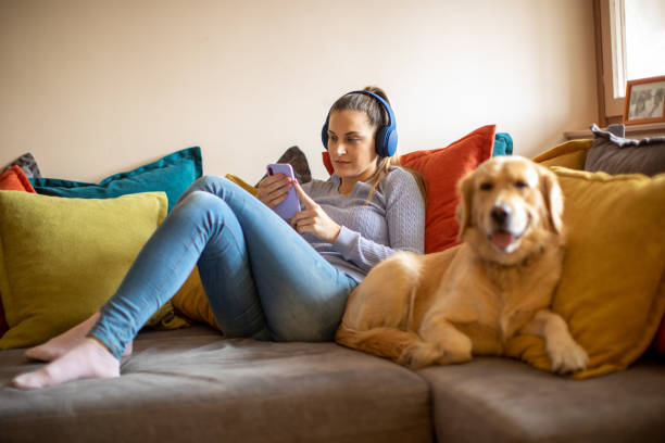istock Young woman enjoying with her dog 1294900246