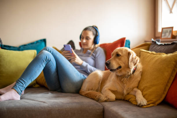 istock Young woman enjoying with her dog 1294900303