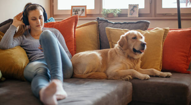 istock Young woman enjoying with her dog 1294900325