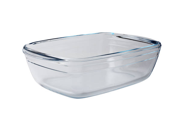 Glass empty baking tray. Isolated on a white background, close-up