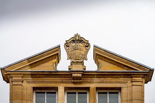 Munich, Germany -April 27,2022: Details of stone ornaments on the facades of baroque buildings in the German city Munich which is the capital city in Bavaria.