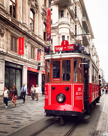22 May 2018, Istanbul, Turkey - Red retro tram on Istiklal street, Beyoglu