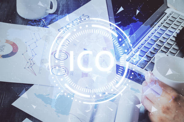 istock Crypto currency theme hologram with businessman working on computer on background. Concept of blockchain. Double exposure. 1294907271