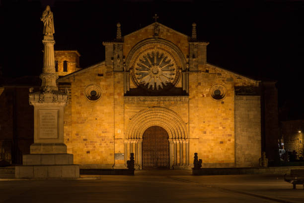 San Pedro Church at Plaza del Mercado Grande Square with Palomilla Monument - Avila, Spain