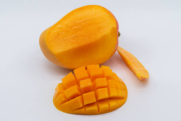 istock Cut and peeled tropical green mango on white background.  Fresh fruit.  Tropical fruit 1294909339