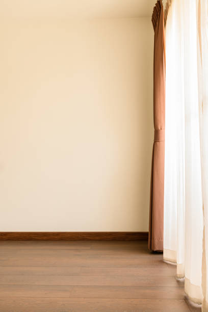 istock The empty room has wooden floors and curtains- 1294911104