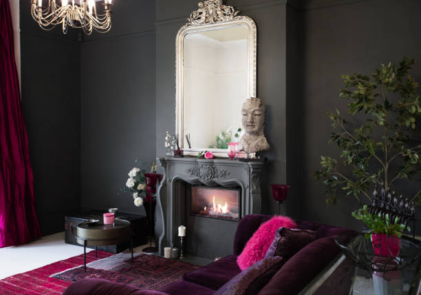 istock Living room with dark walls and authentic fireplace 1294912743