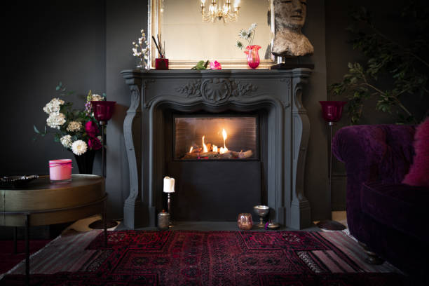 istock Living room with dark walls and authentic fireplace 1294913344