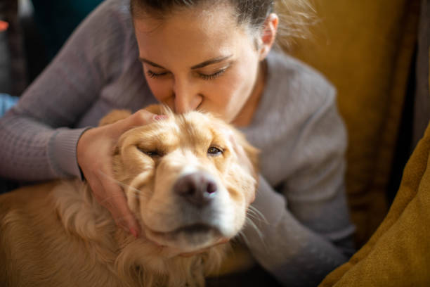 istock Young woman enjoying with her dog 1294913349