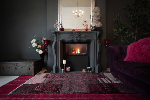 istock Living room with dark walls and authentic fireplace 1294913385