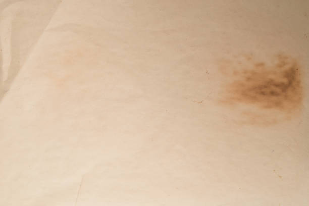 istock Old crumpled beige paper background. 1294917978