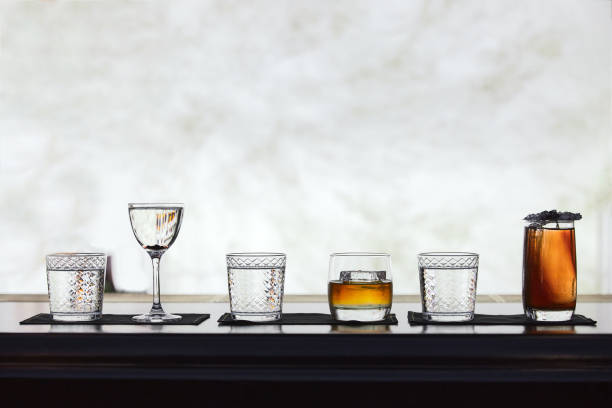 istock Row of different simple cocktail drinks, darker themes 1294918163