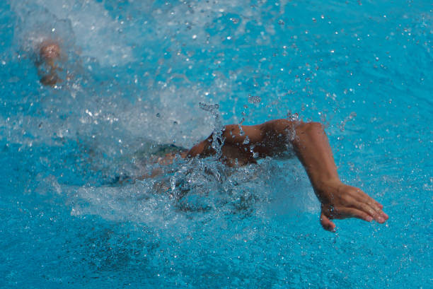 istock Swimmer performing a free style training for a competition. 1294922928