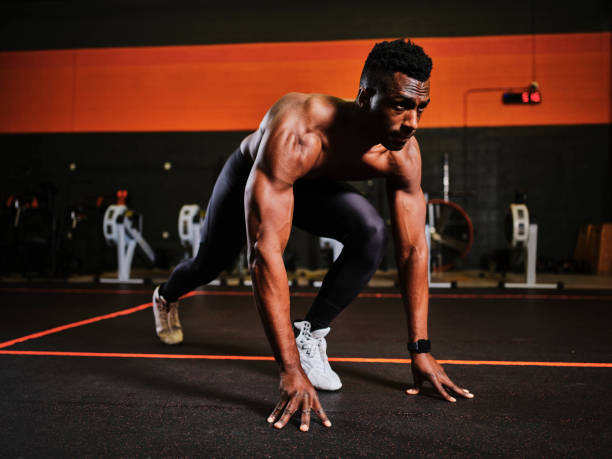 istock Man Working Out in a Gym. 1294923191