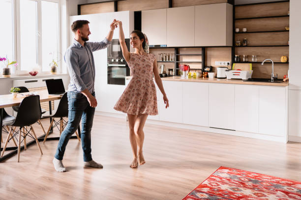 istock Man and woman dancing in a modern interior 1294924506