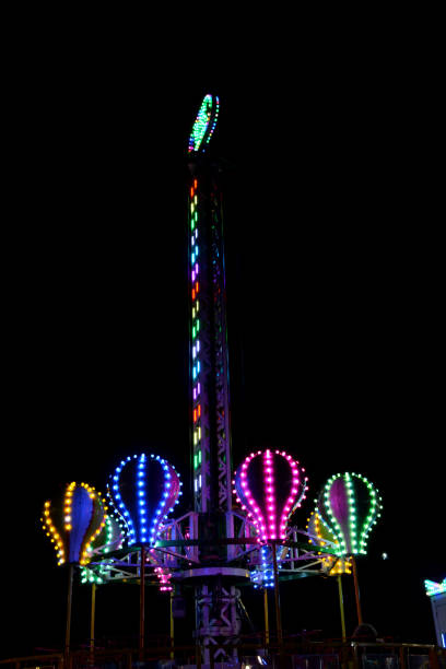 istock Carousel in an amusement park, captured at night 1294924631