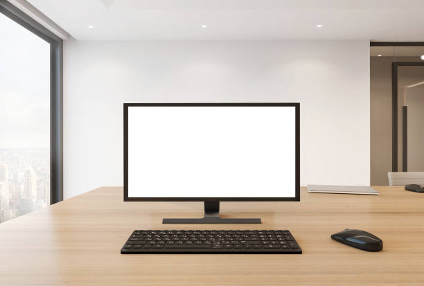 istock Blank computer monitor on office desk 1294929135