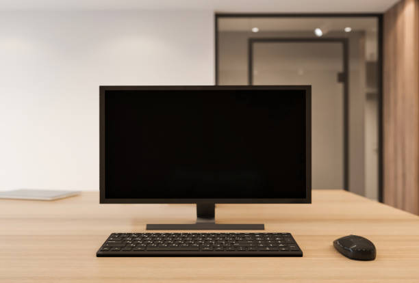 istock Blank computer monitor on office desk 1294929138