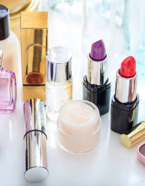 istock Set of makeup cosmetics on white background. Vertical, close up view. 1294930214