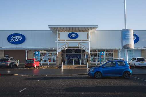 Edinburgh, Scotland - January 6 2021: The Boots location at Craigleith Retail Park in Edinburgh. Boots Pharmacy is a British health and beauty retailer and pharmacy chain.